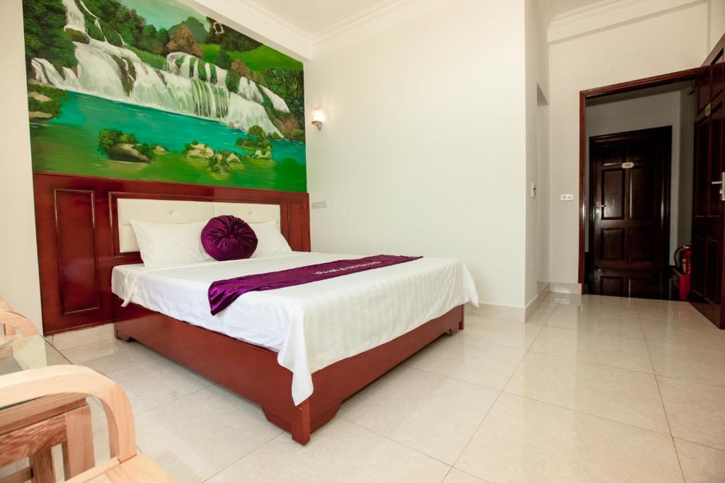 Postel nebo postele na pokoji v ubytování Dang Quang Guesthouse
