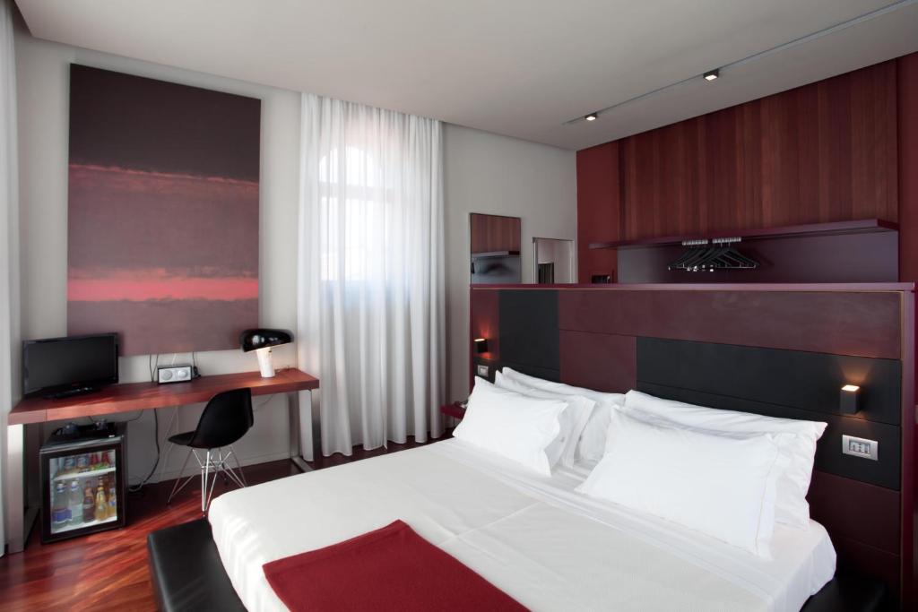 Postel nebo postele na pokoji v ubytování Alter Hotel