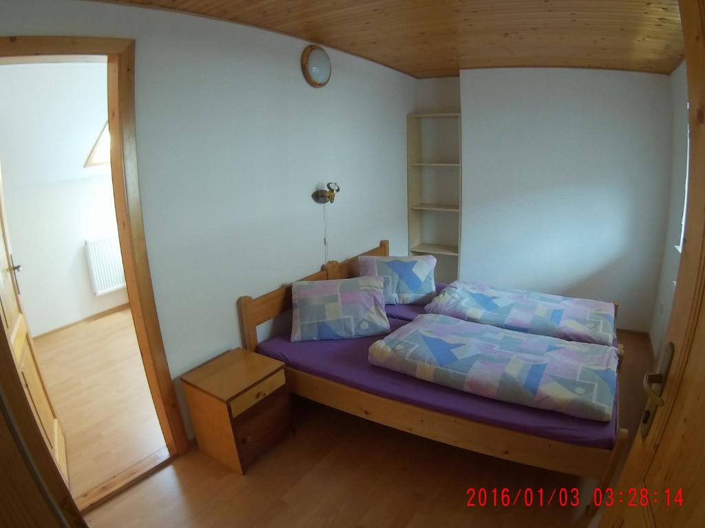 Postel nebo postele na pokoji v ubytování Apartment Majerčák