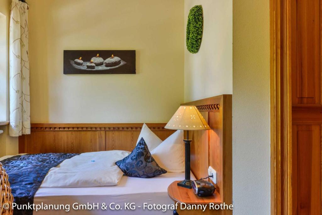 Postel nebo postele na pokoji v ubytování Hotel Oberwirt