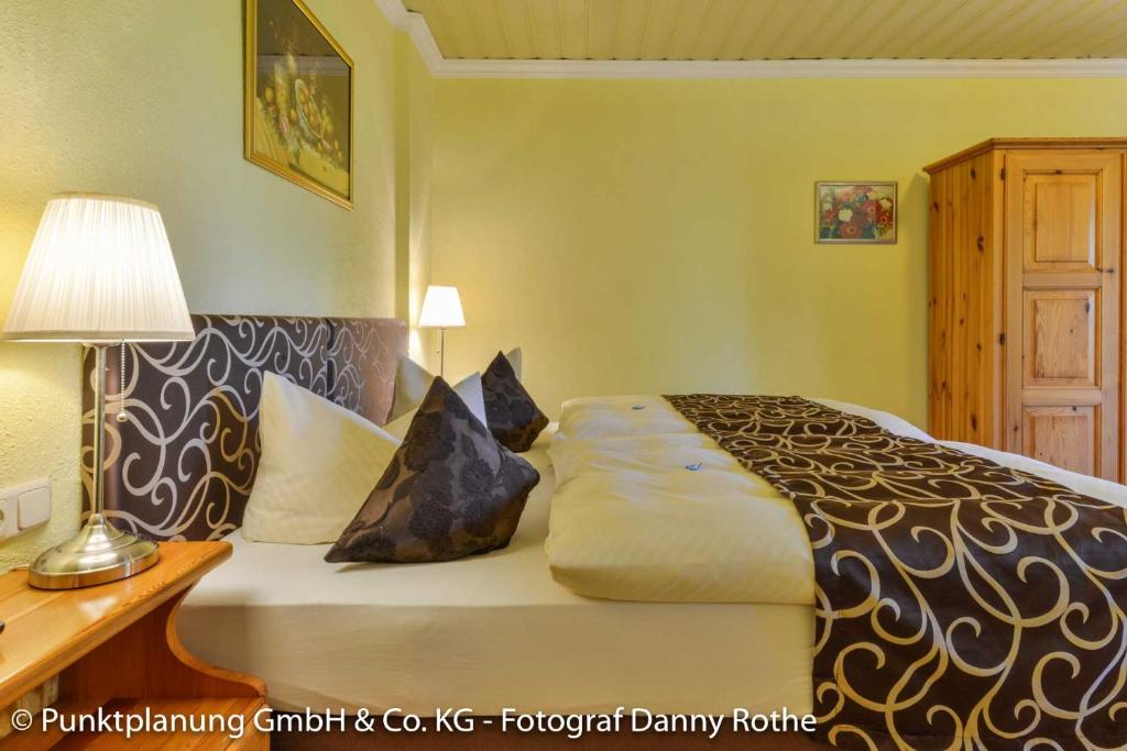 Postel nebo postele na pokoji v ubytování Hotel Oberwirt