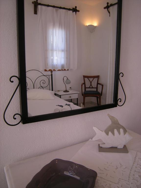 Postel nebo postele na pokoji v ubytování Roussos Beach Hotel