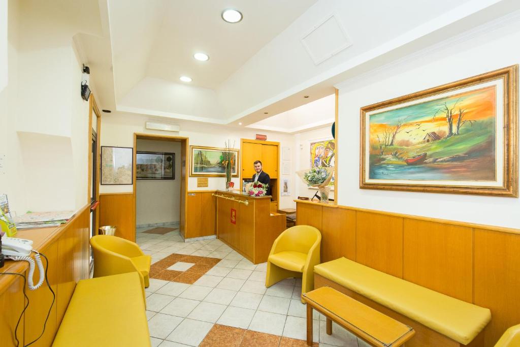 Kuchyň nebo kuchyňský kout v ubytování Hotel Concorde