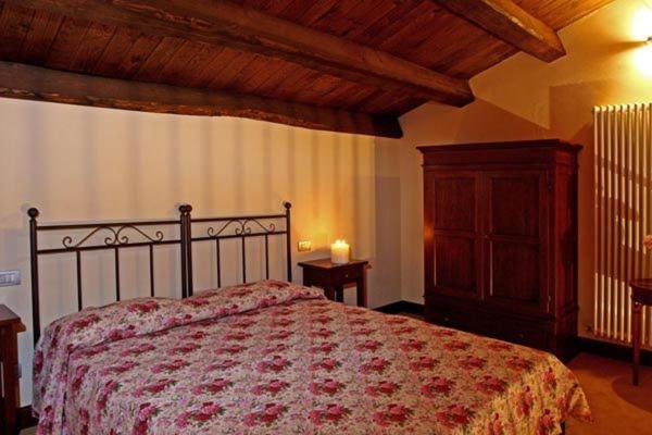 Postel nebo postele na pokoji v ubytování Residence Borgo Da Mare