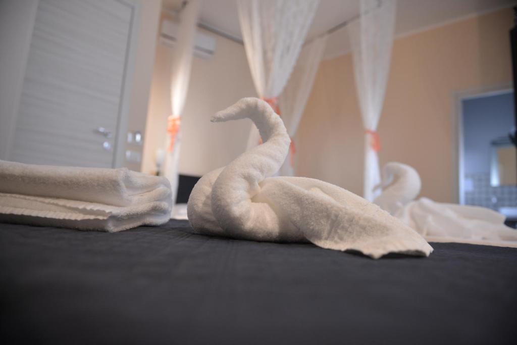 Postel nebo postele na pokoji v ubytování La Gioia di Sicilia B&B