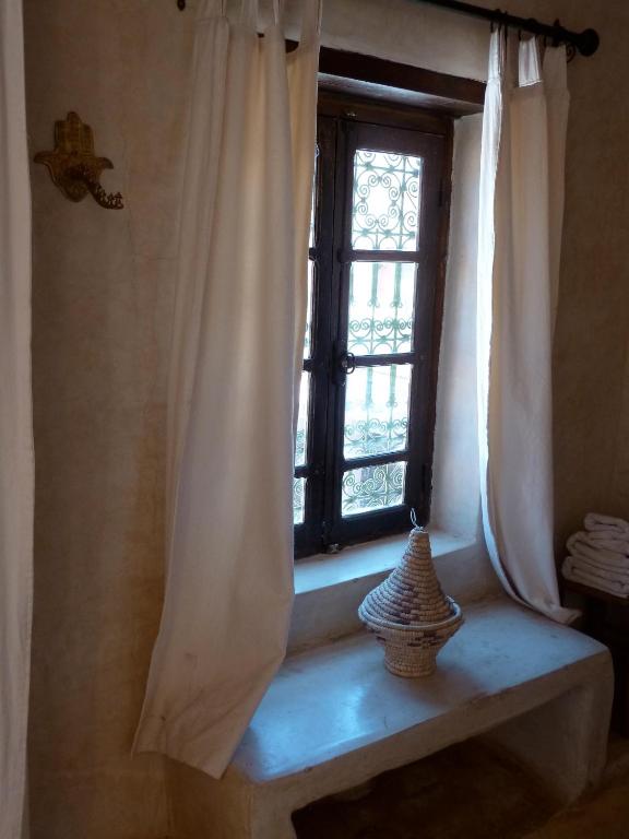 Una cama o camas en una habitación de Riad Cascades d'Ouzoud