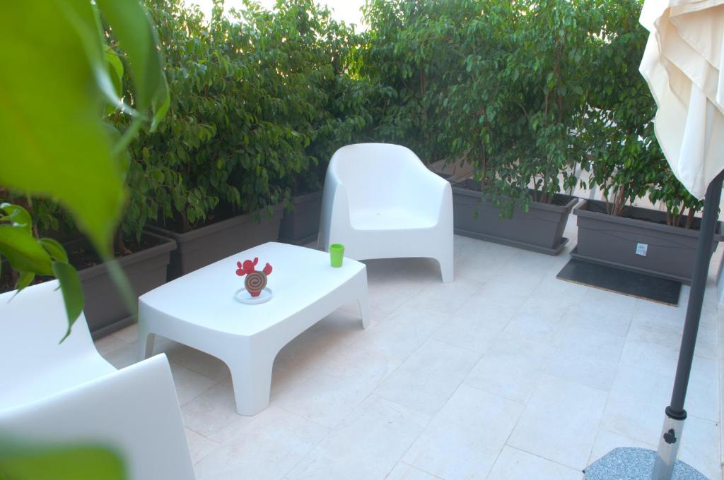 Posedenie v ubytovaní Four Rooms Guesthouse