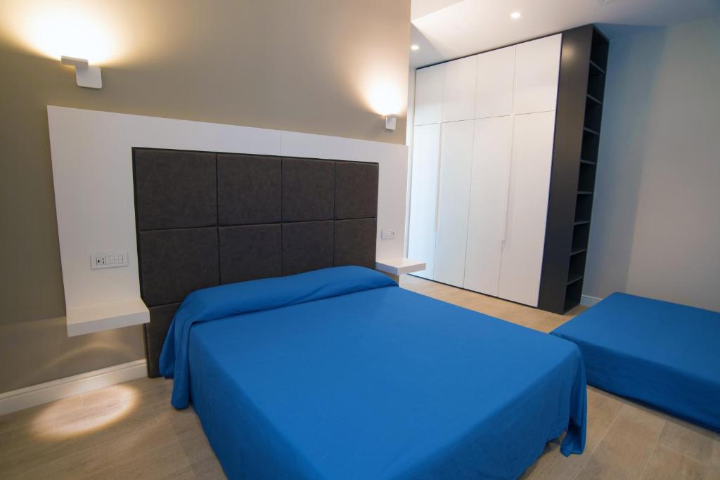 Posteľ alebo postele v izbe v ubytovaní B & B REGINA MARGHERITA