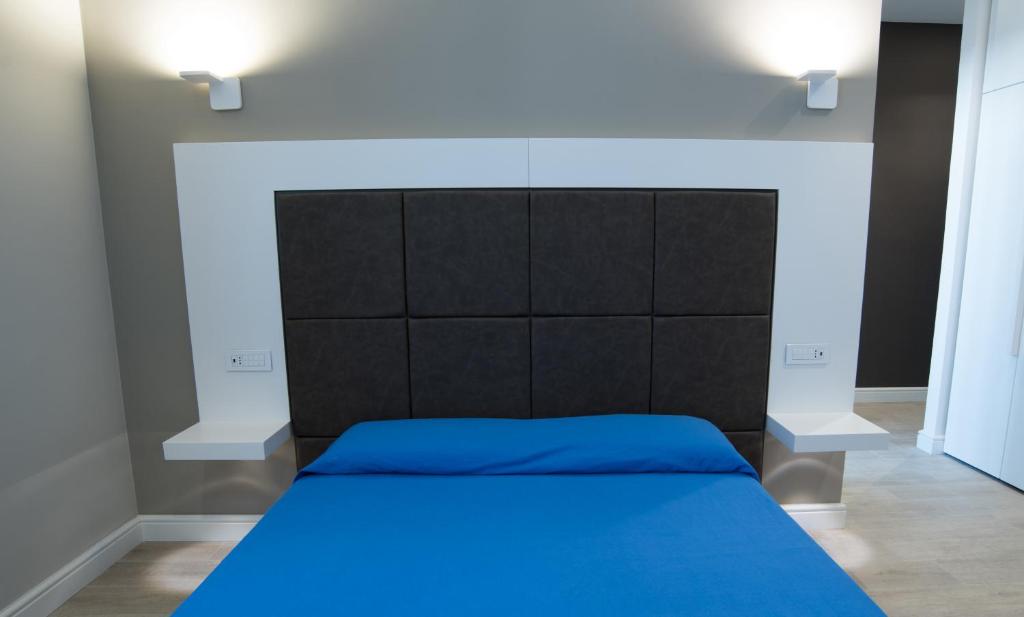 Posteľ alebo postele v izbe v ubytovaní B & B REGINA MARGHERITA