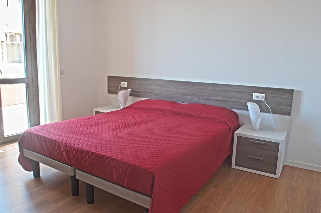 Posteľ alebo postele v izbe v ubytovaní Four Rooms Guesthouse