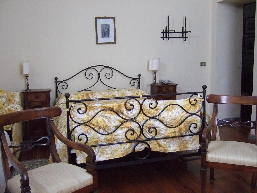 Postel nebo postele na pokoji v ubytování Santuario di Oropa