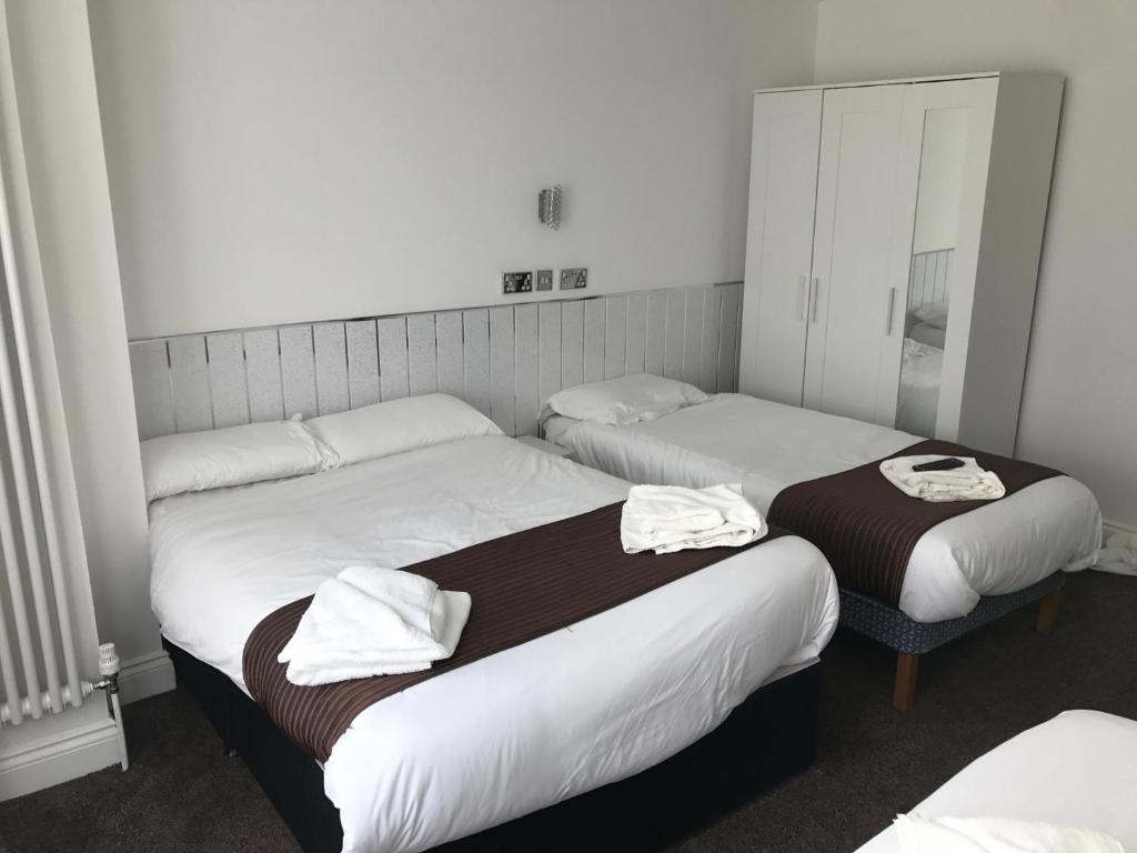 Postel nebo postele na pokoji v ubytování St George Hotel Great Yarmouth
