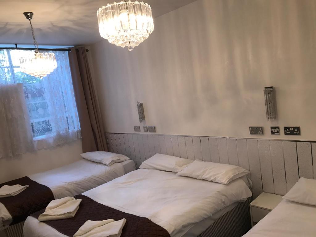 Postel nebo postele na pokoji v ubytování St George Hotel Great Yarmouth