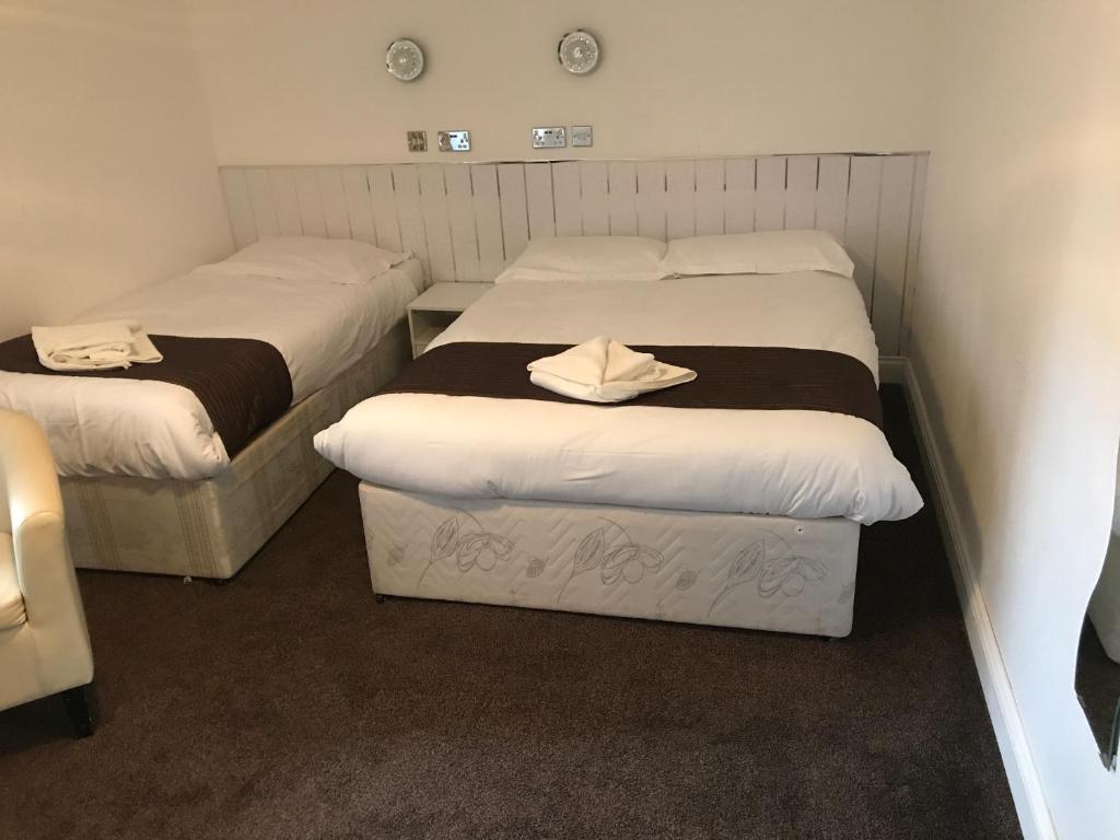 Postel nebo postele na pokoji v ubytování St George Hotel Great Yarmouth