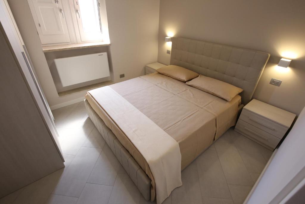 Postel nebo postele na pokoji v ubytování Sole d'Ortigia