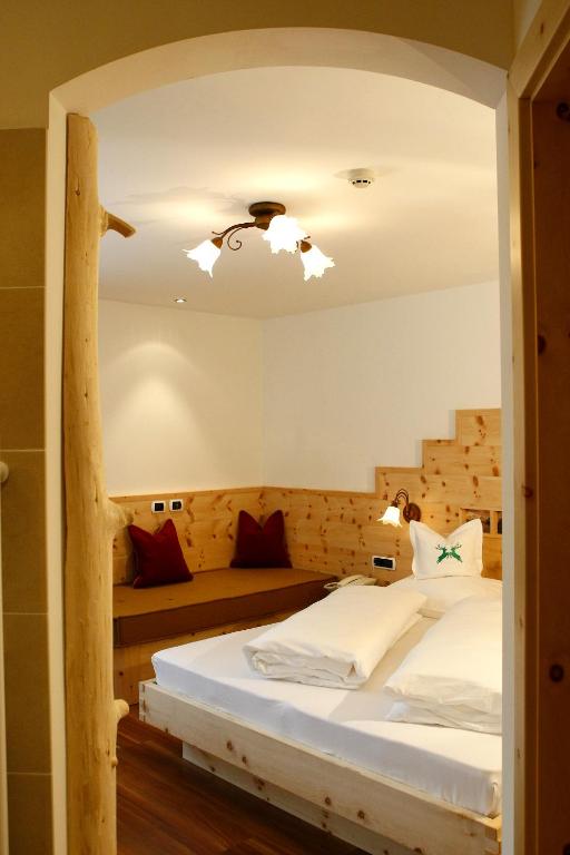Postel nebo postele na pokoji v ubytování Hotel Edda