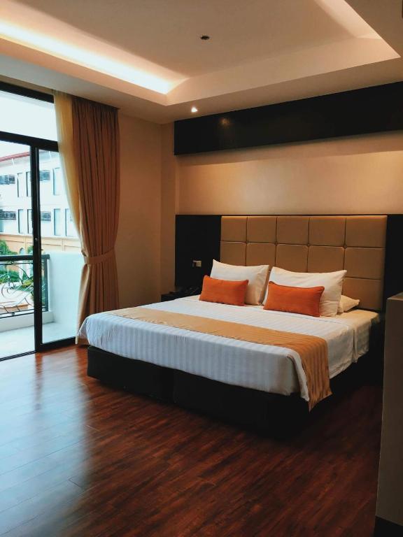Postel nebo postele na pokoji v ubytování Hotel Oazis