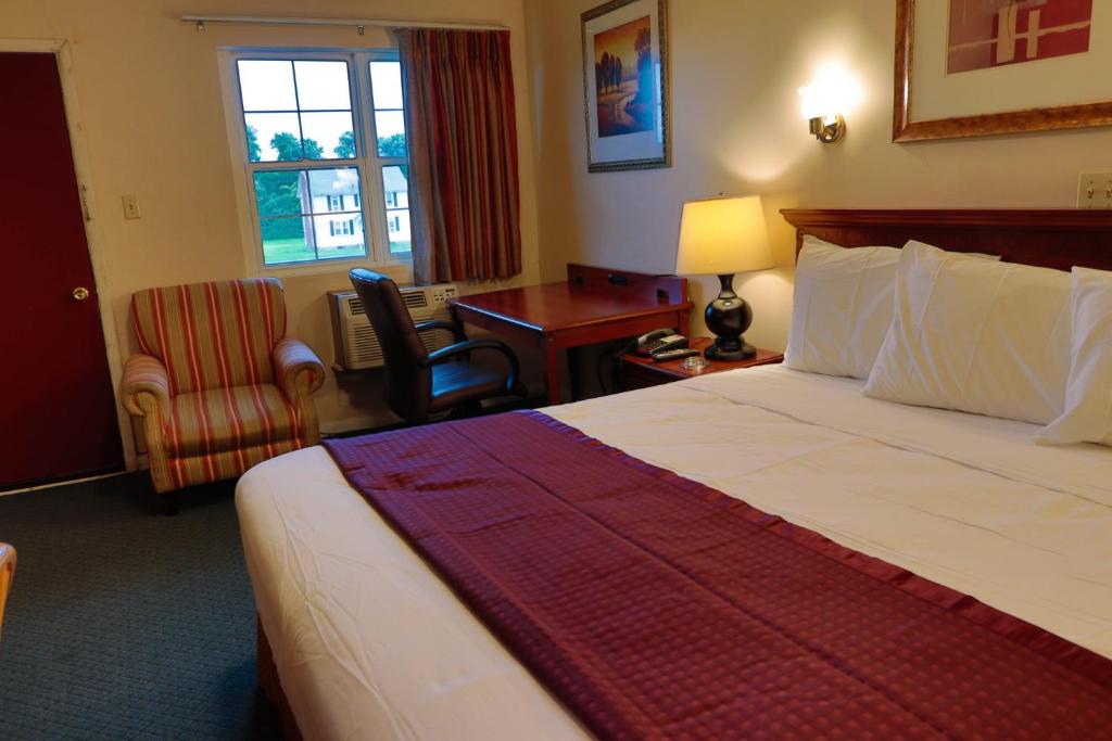 Postel nebo postele na pokoji v ubytování Red Carpet Inn Berlin
