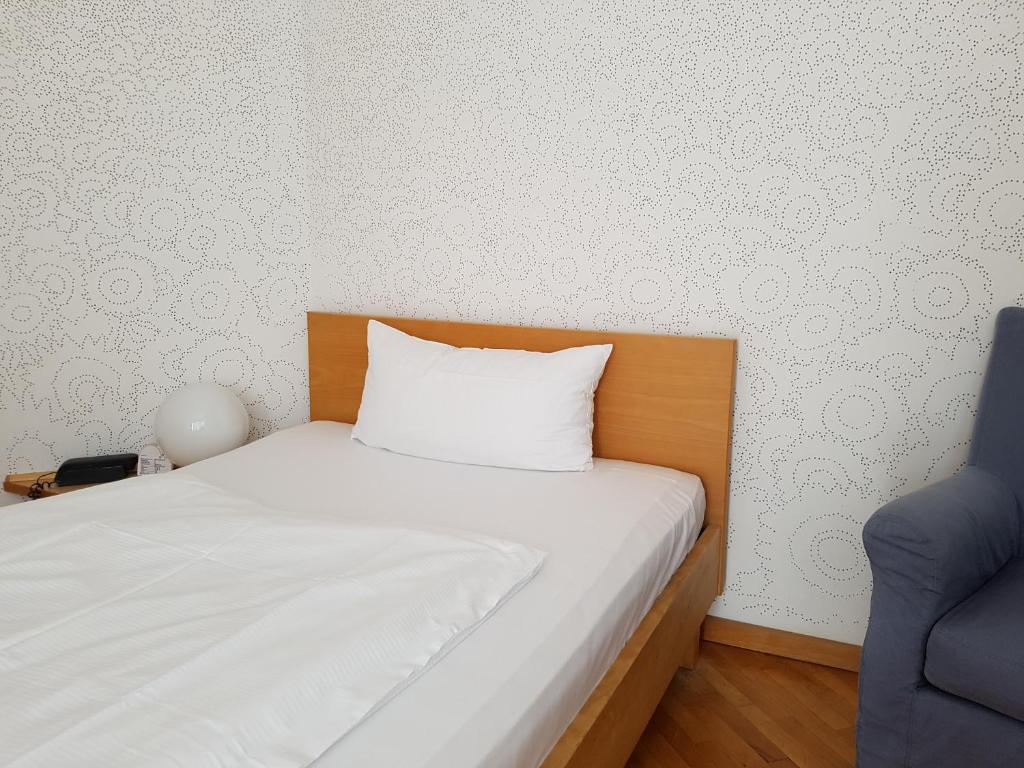 Postel nebo postele na pokoji v ubytování Art-Hotel Robert Mayer