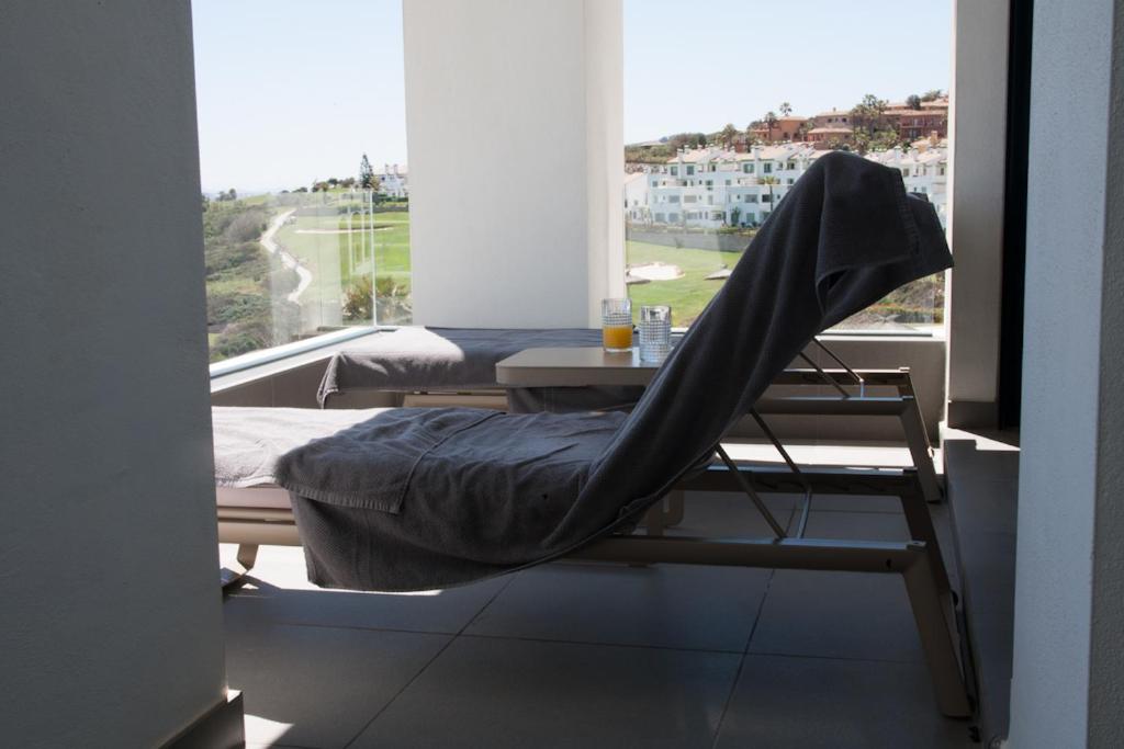 Posezení v ubytování Luxury Apartment Sea, Golf and Gibraltar View, Alcaidesa The Links, Ap 102