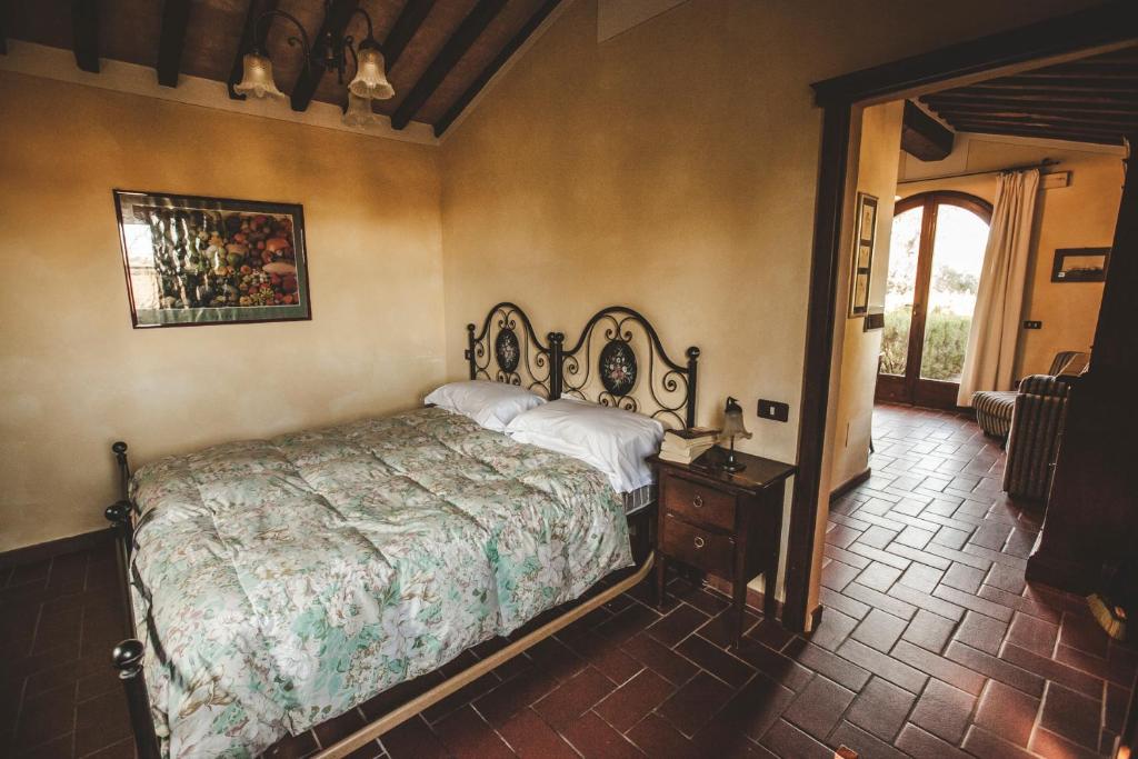 Postel nebo postele na pokoji v ubytování Agriturismo Zampugna