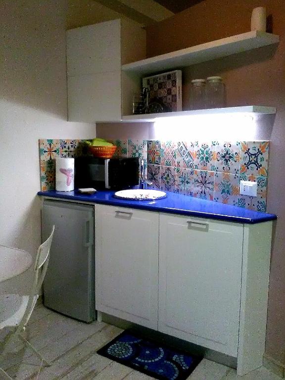 A kitchen or kitchenette at Casa vacanze Scurò - Isnello