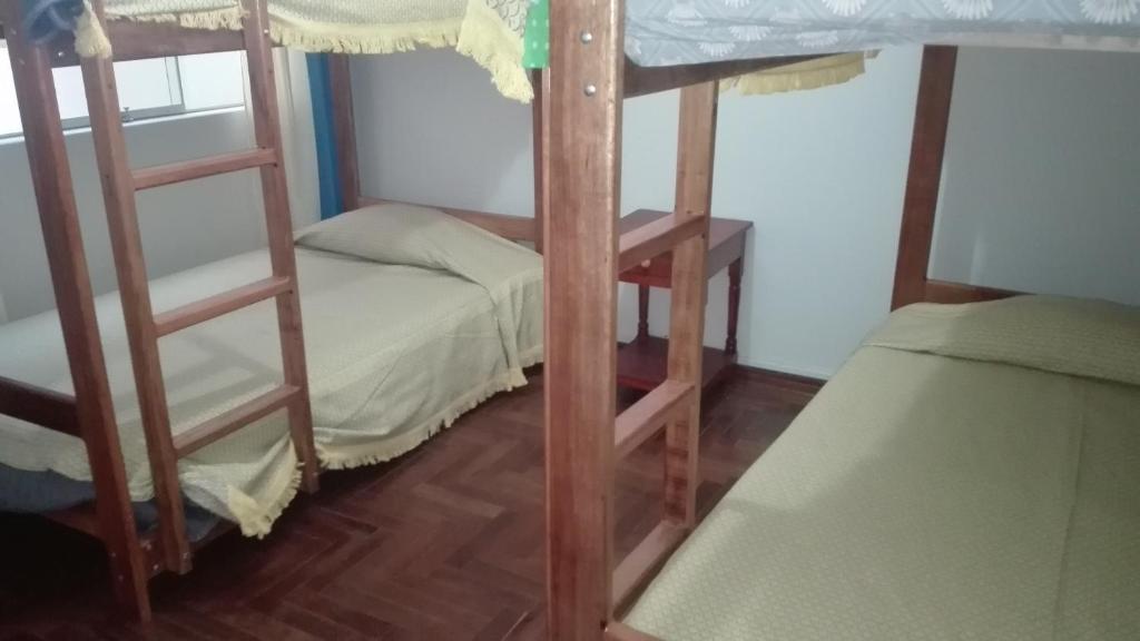 Postel nebo postele na pokoji v ubytování Hostel Puno Backpackers