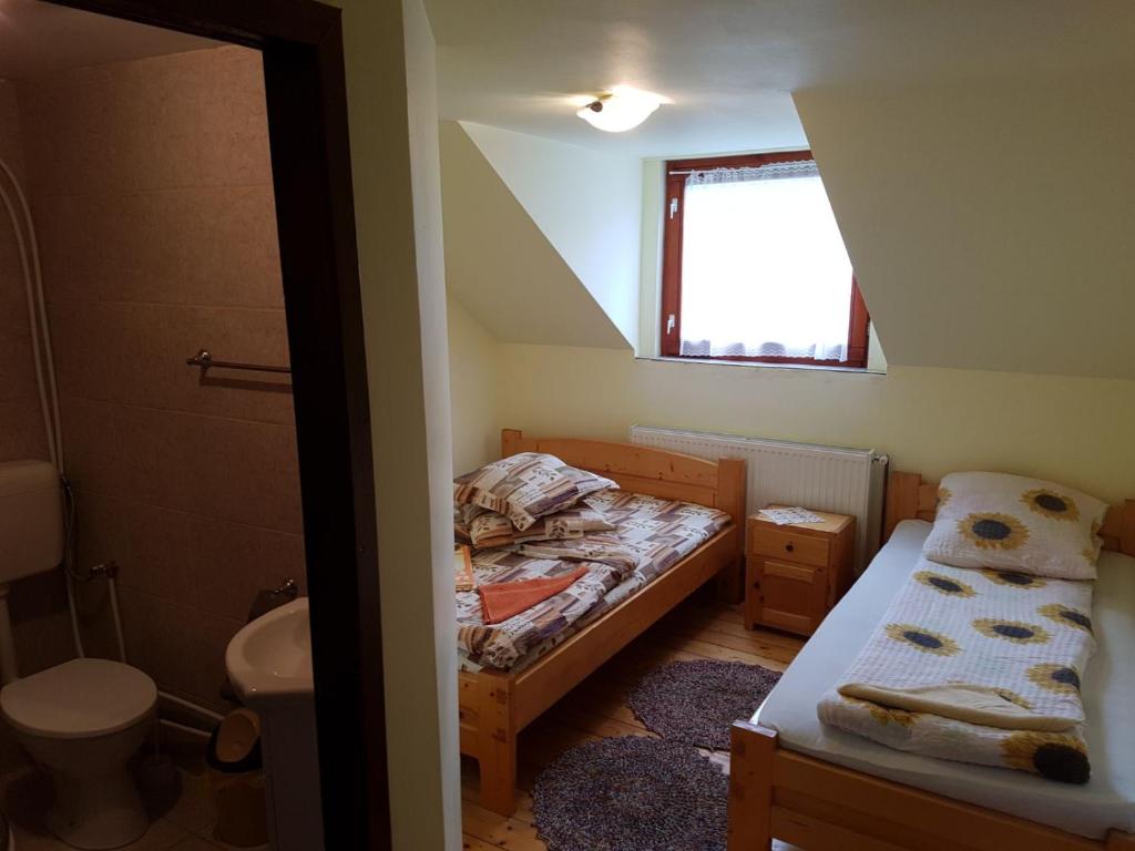 Letto o letti in una camera di Cabana Suciu