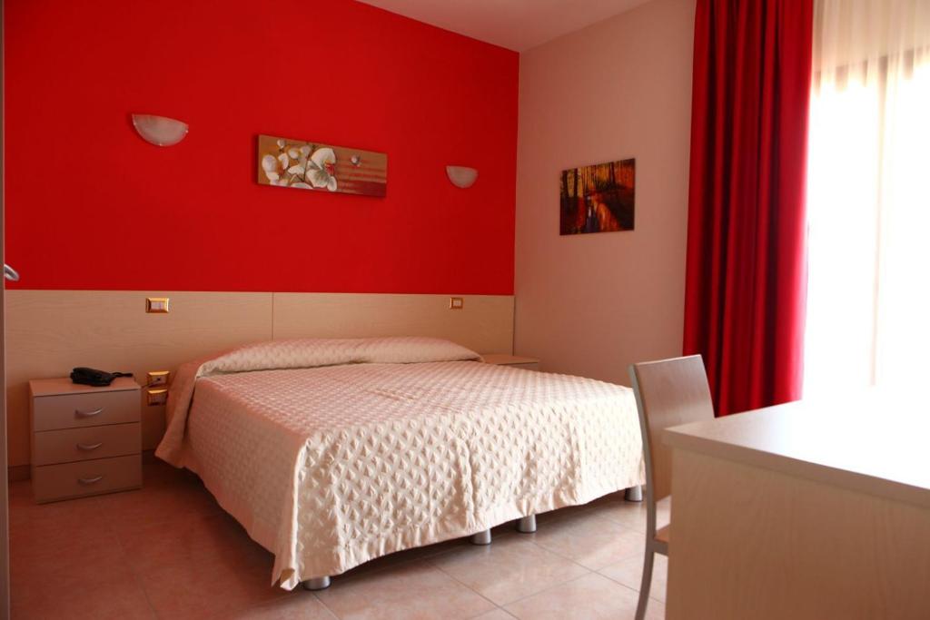 Posteľ alebo postele v izbe v ubytovaní Casale degli Ulivi Resort