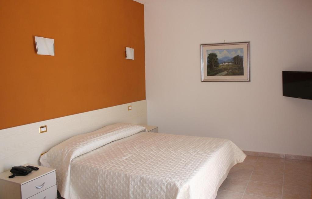 Televízia a/alebo spoločenská miestnosť v ubytovaní Casale degli Ulivi Resort