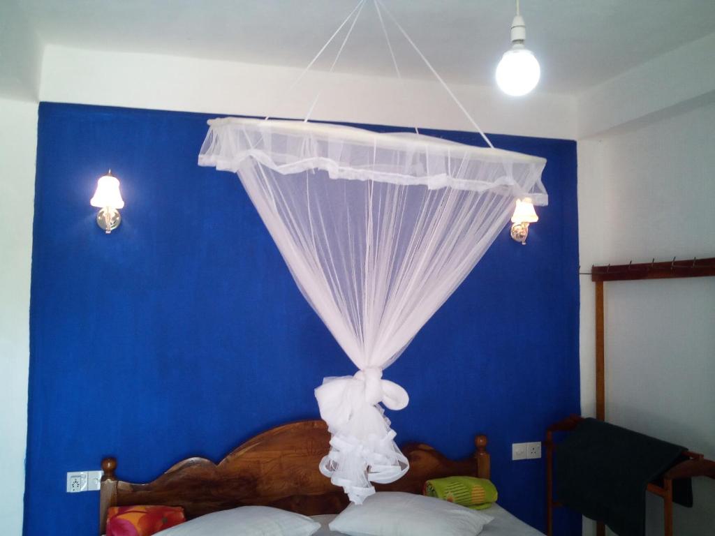 Postel nebo postele na pokoji v ubytování Mellow Homestay
