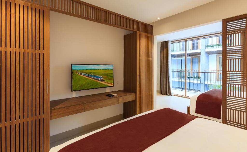 TV/trung tâm giải trí tại Tam House Villa Hotel