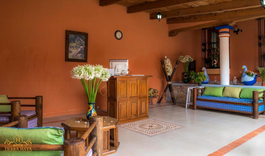 Postel nebo postele na pokoji v ubytování Hotel Tierra Maya