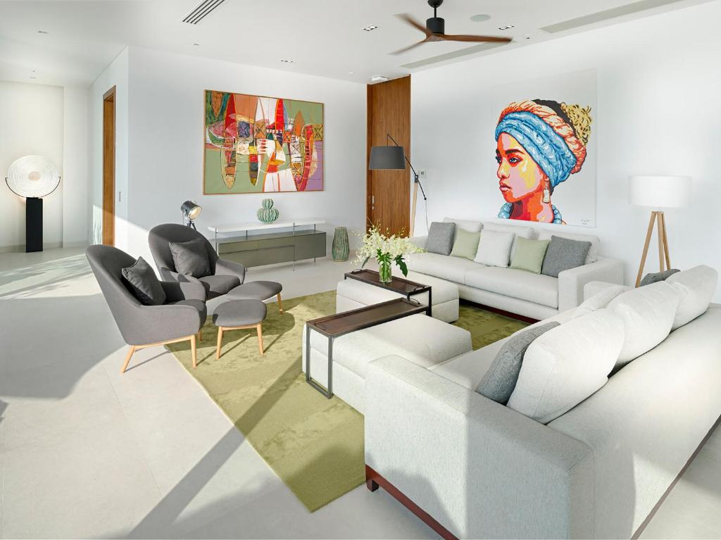 Ein Sitzbereich in der Unterkunft Malaiwana Residences