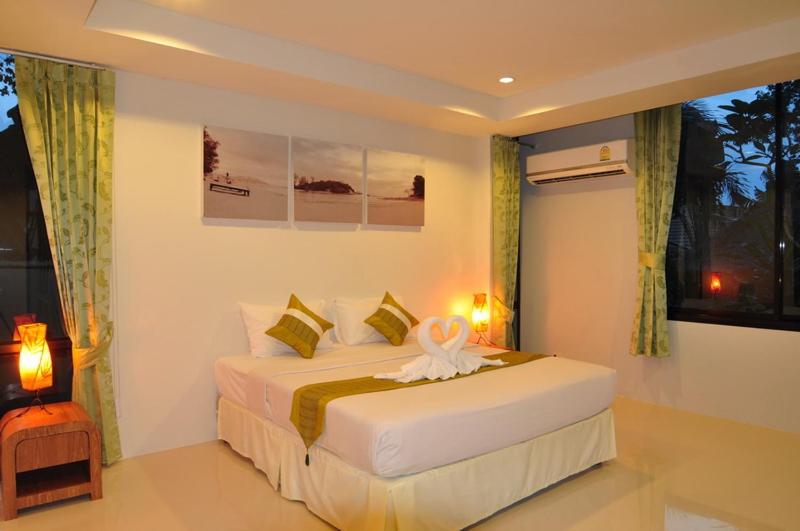 Postel nebo postele na pokoji v ubytování Samui Honey Tara Villa Residence