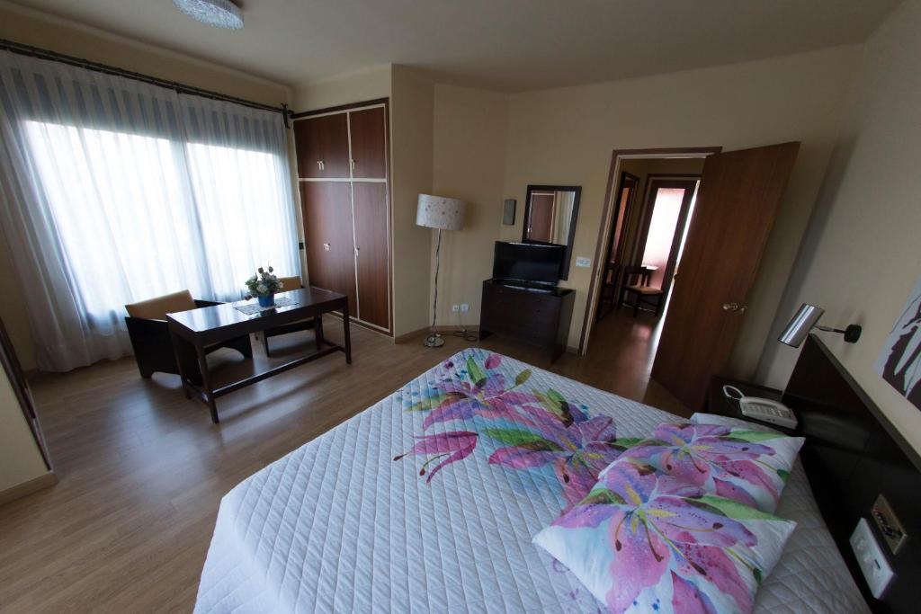 Postel nebo postele na pokoji v ubytování Hotel Gran Sol