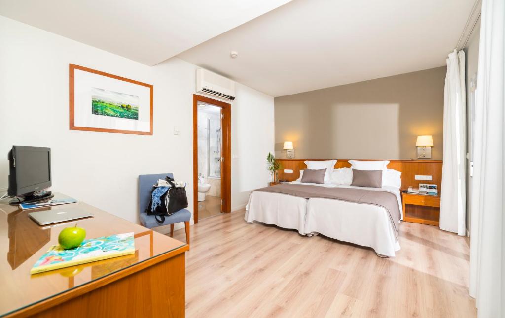 Postel nebo postele na pokoji v ubytování Hotel & Spa Terraza 4 Sup
