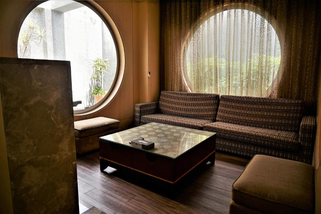 Posezení v ubytování Her Home Spa Motel Xinying