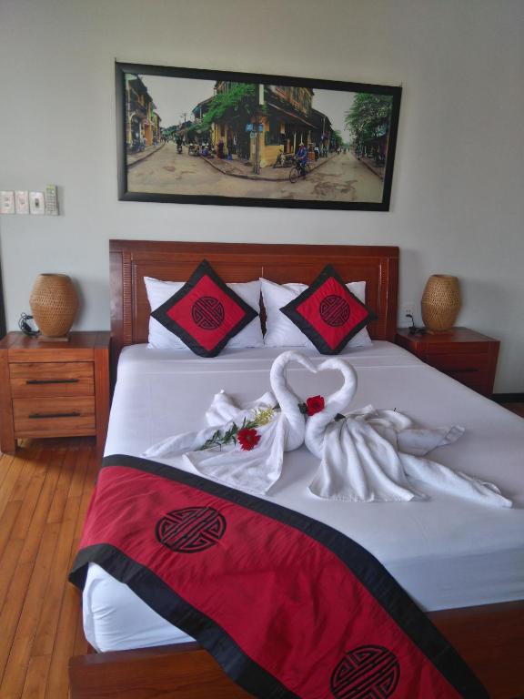 Postel nebo postele na pokoji v ubytování Green CoCo HomeStay