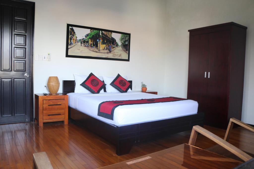Postel nebo postele na pokoji v ubytování Green CoCo HomeStay