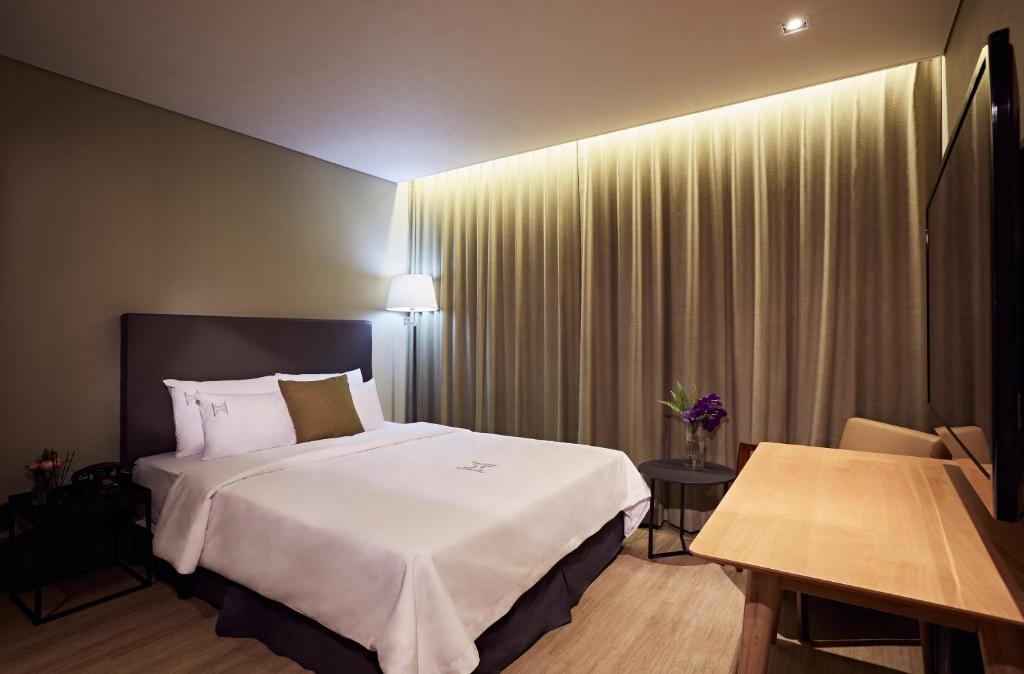 Кровать или кровати в номере Healasis