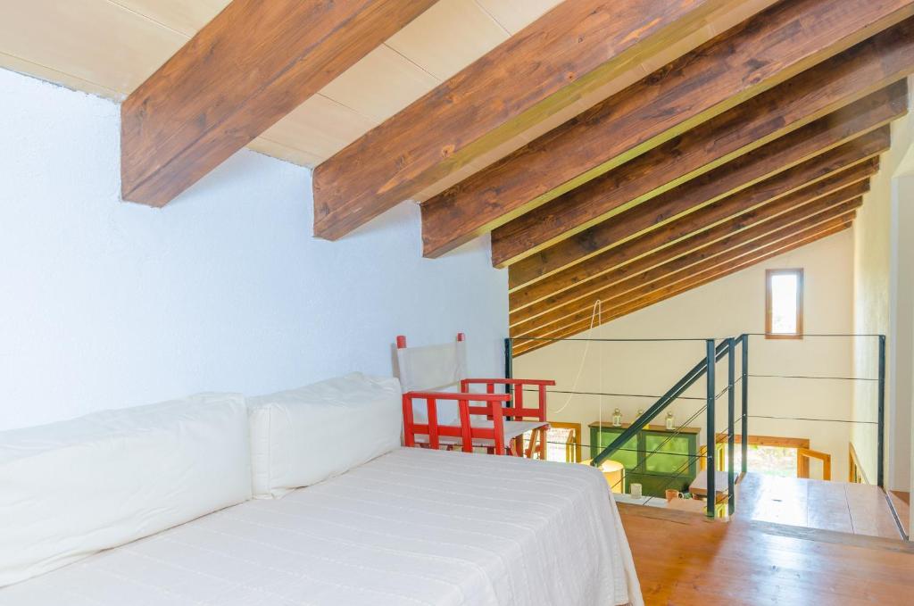 Postel nebo postele na pokoji v ubytování Son Sabater (Es Moli Nou)