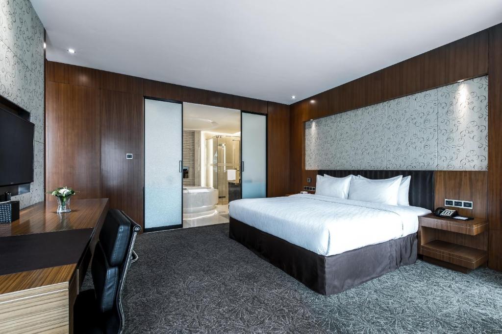 Postel nebo postele na pokoji v ubytování Vanburgh Hotel - Free shuttle bus transfer during Canton Fair