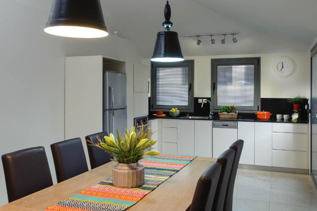 Kuchyň nebo kuchyňský kout v ubytování Rafael Residence Boutique
