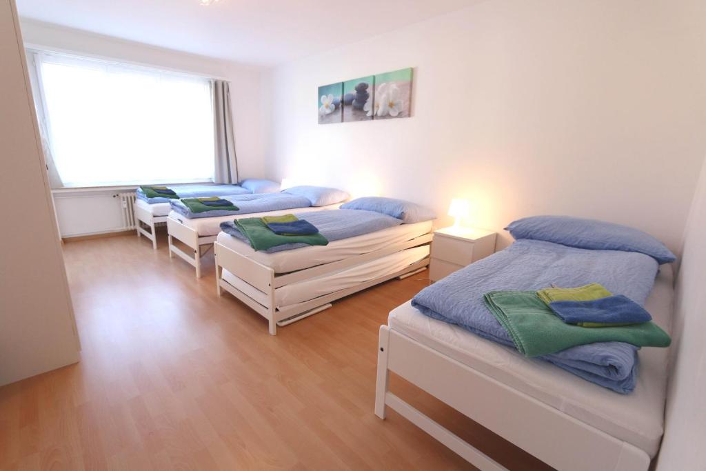 Postel nebo postele na pokoji v ubytování Apartment Bünda