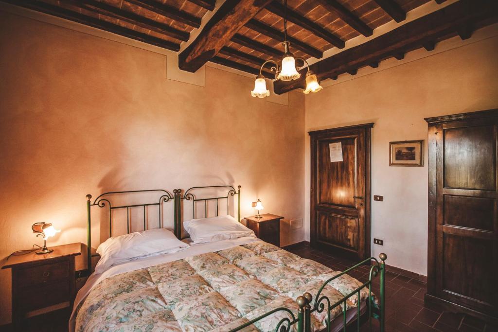 Postel nebo postele na pokoji v ubytování Agriturismo Zampugna