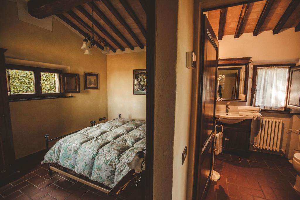 Postel nebo postele na pokoji v ubytování Agriturismo Zampugna
