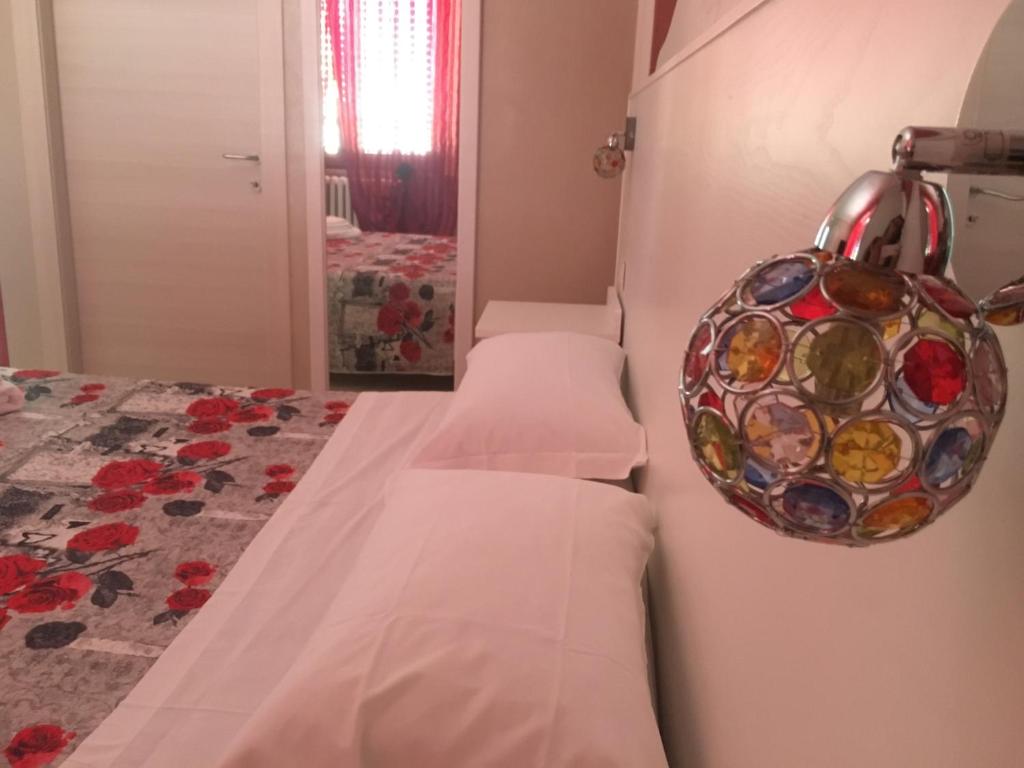 Postel nebo postele na pokoji v ubytování Il Rifugio di Dante