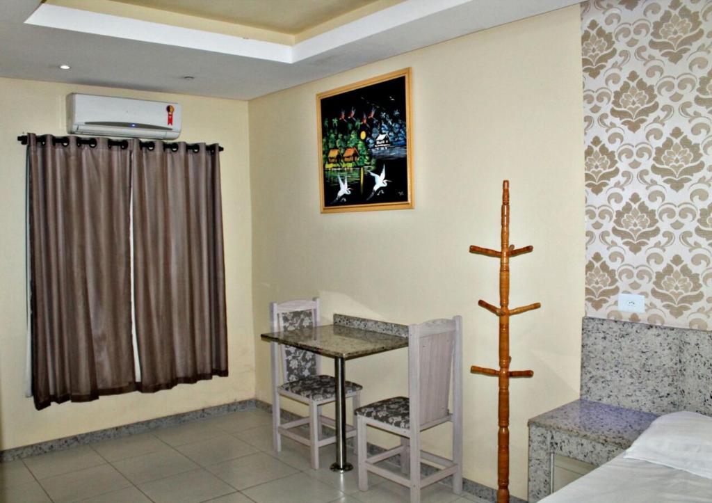 TV a/nebo společenská místnost v ubytování Hotel Farol da Barra