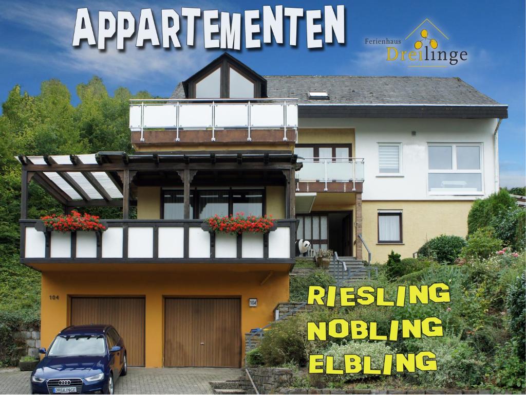 a magazine cover of a house with a car parked in front at Ferienhaus Dreilinge in Cochem
